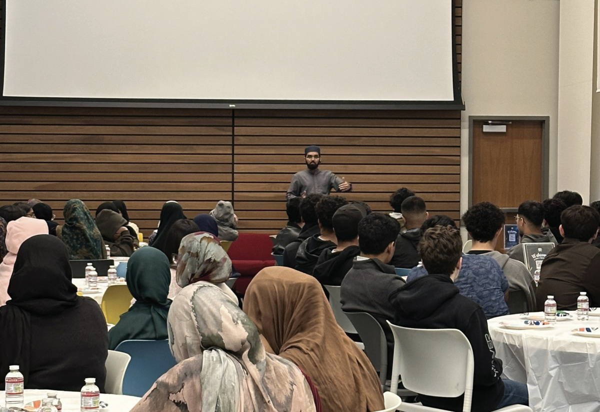 Speaker Ustadh Basil Farooq talks to students at Campus Village Building 2 in the multipurpose room on Wednesday evening at San José State University.